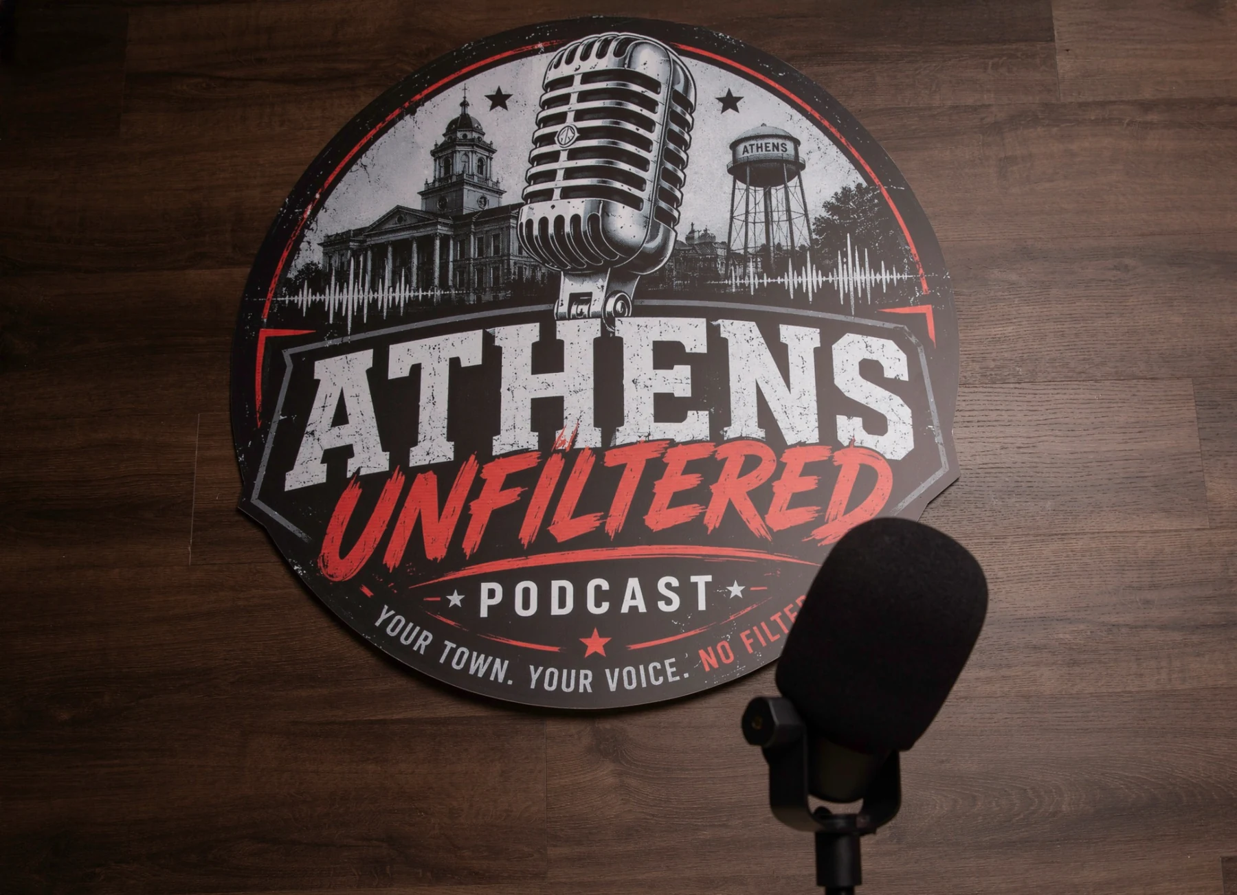 Athens Unfiltered host in the podcast studio
